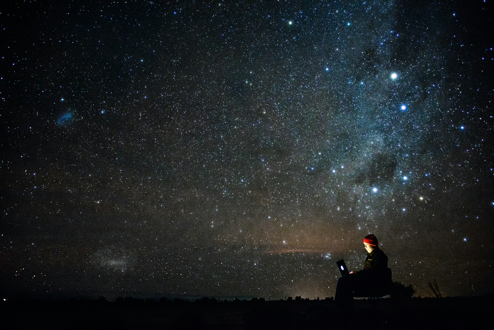 human under starry night